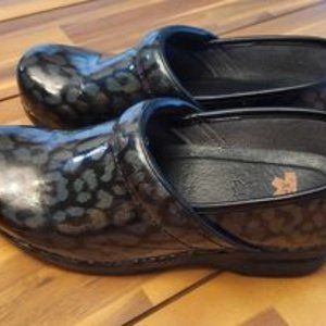 Dansko Iridescent Leopard Clogs